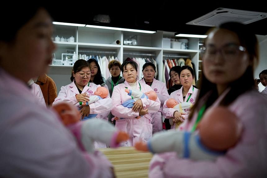 need-a-nanny?-chinese-school-trains-women-to-take-care-of-newborns
