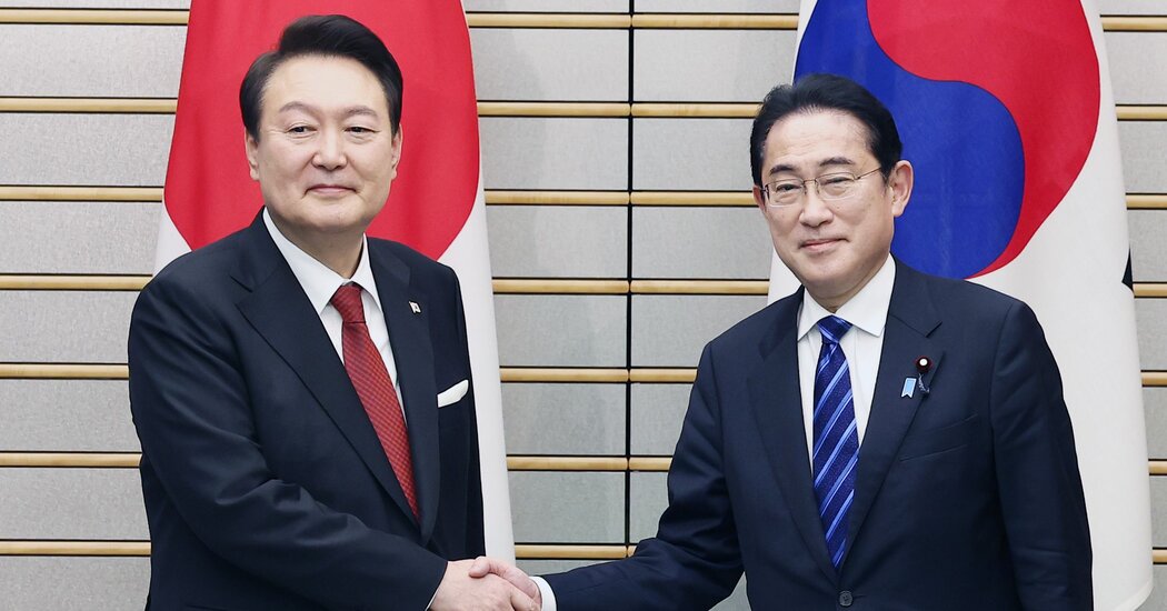 video:-japanese-prime-minister-greets-south-korean-president